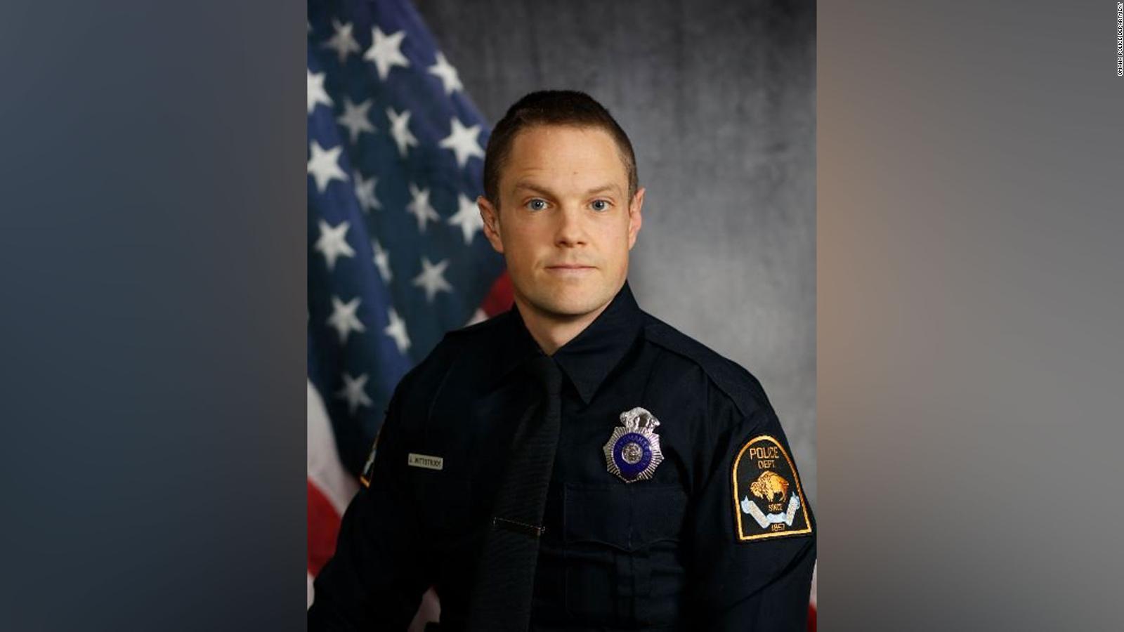 An Omaha police officer was shot four times while ...