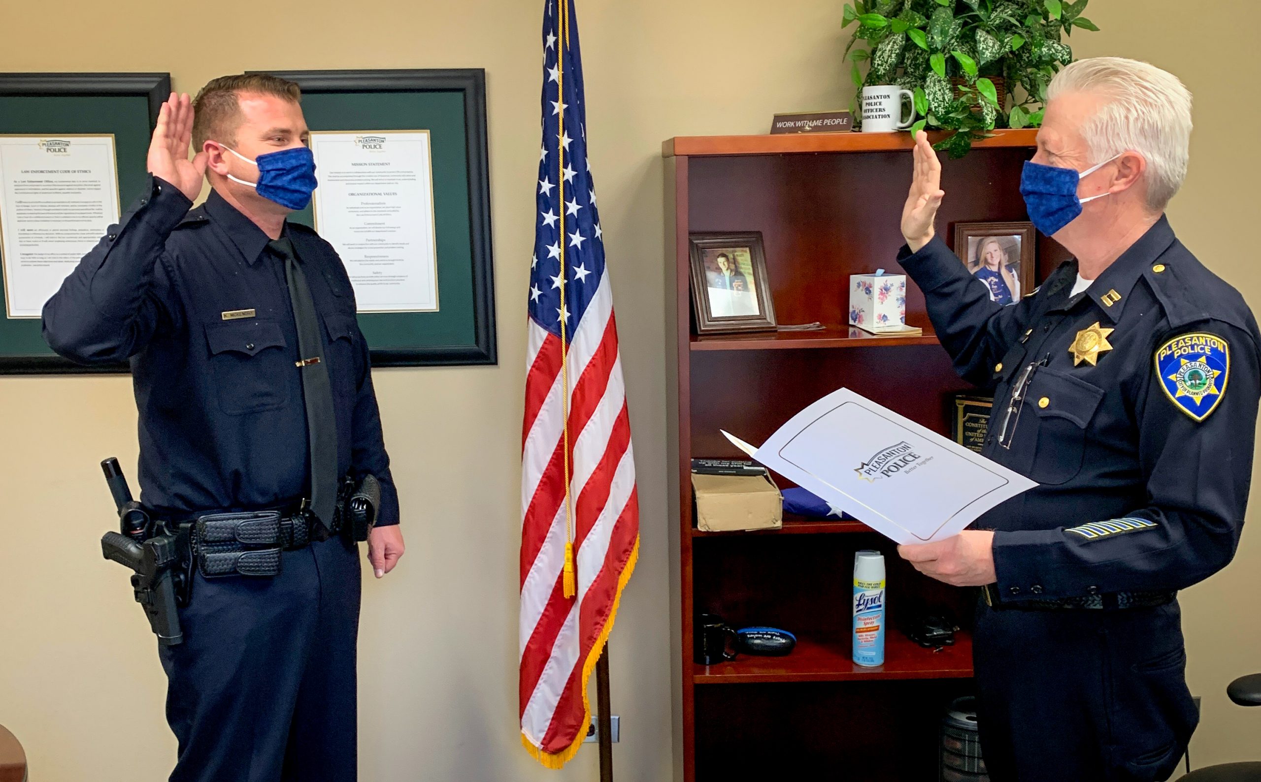 Newest Pleasanton police officer sworn in with masked ...