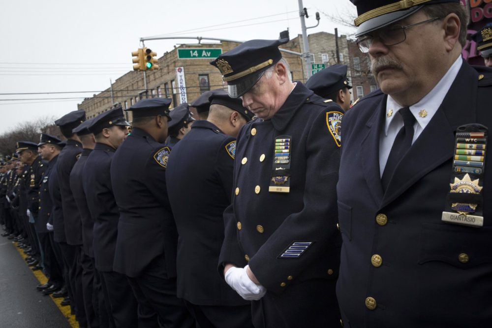 NYC Mayor Eulogizes Officer As Cops Outside Turn Backs ...