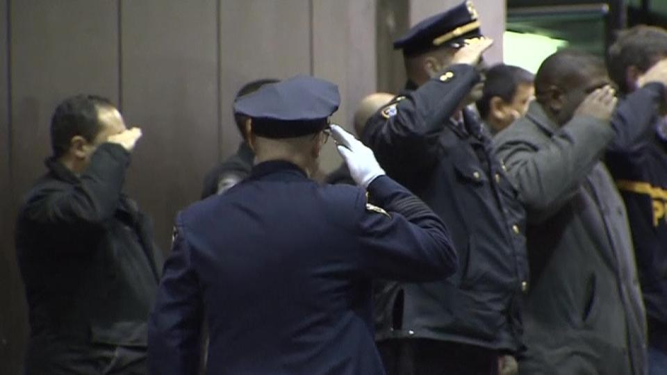 NYPD officers salute their fallen comrades [Video]