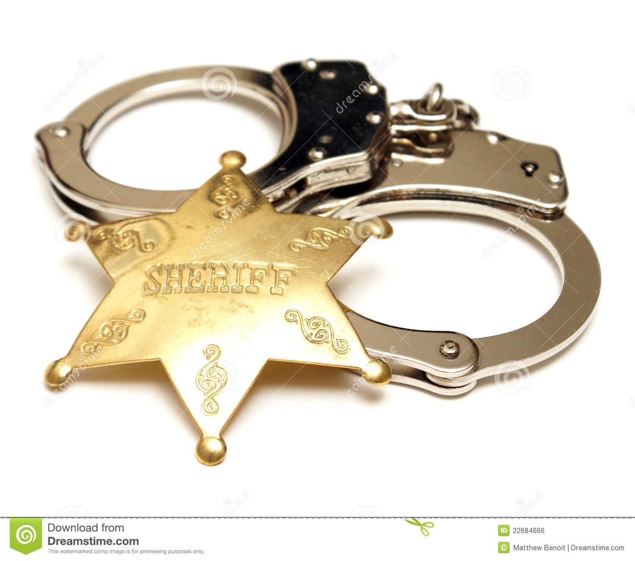 Sheriff Badge And Handcuffs Stock Photo