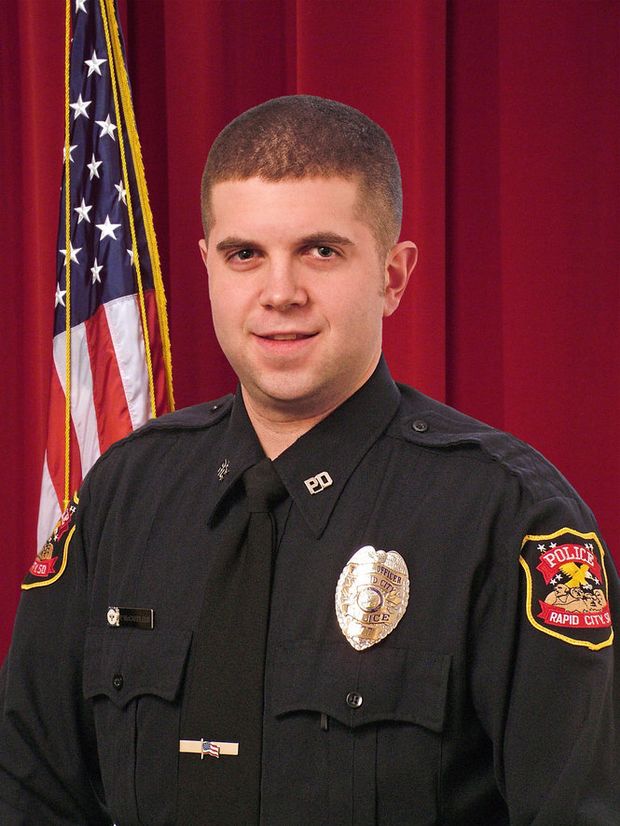 South Dakota police officer who died after shootout was son of retired ...