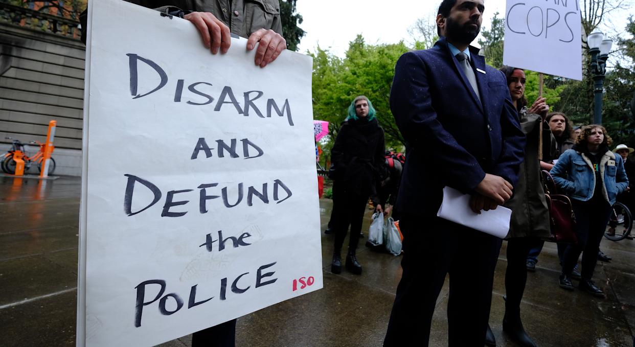 What does " defund the police"  really mean?